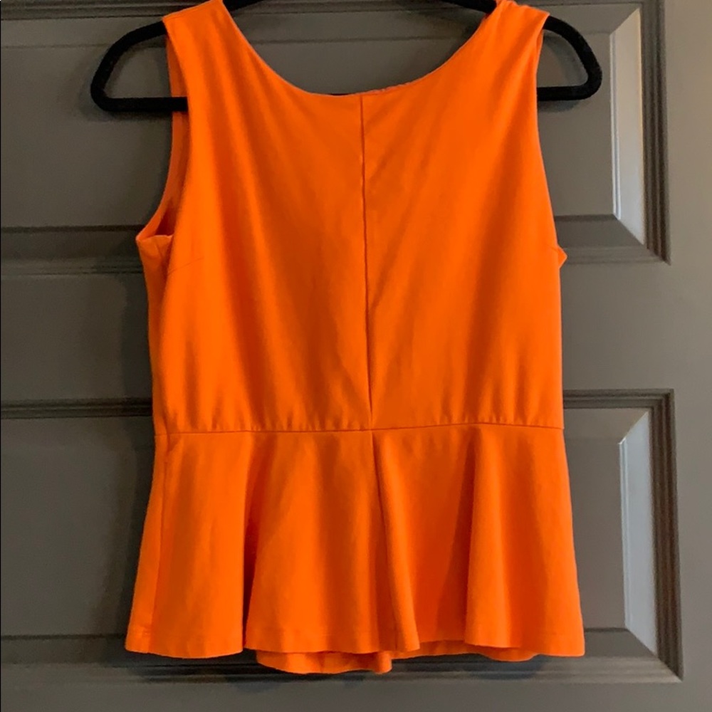 Orange peplum top
